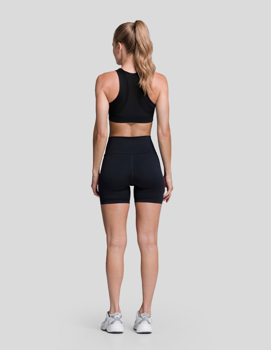 Conjunto deportivo ajustado con elástico para mujer 4