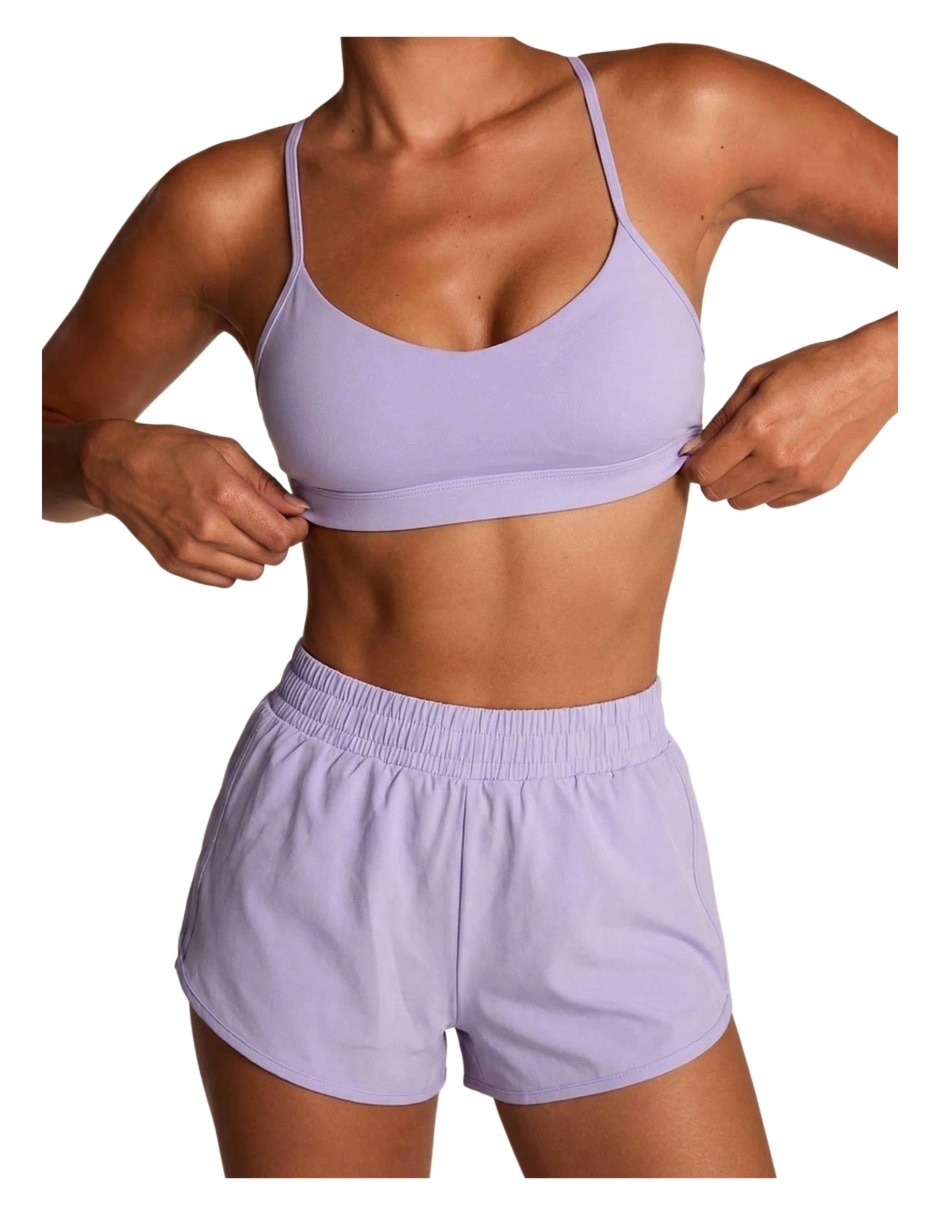 Conjunto deportivo regular con elástico para mujer 4
